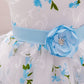 Girls White & Blue Floral Party Dress with Bow and Flower Belt – Elegant Summer Outfit